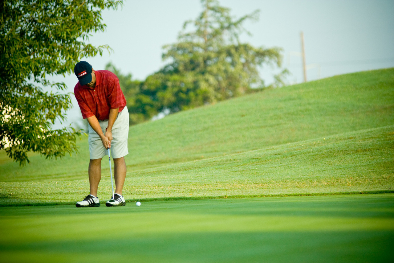 Person spiller golf